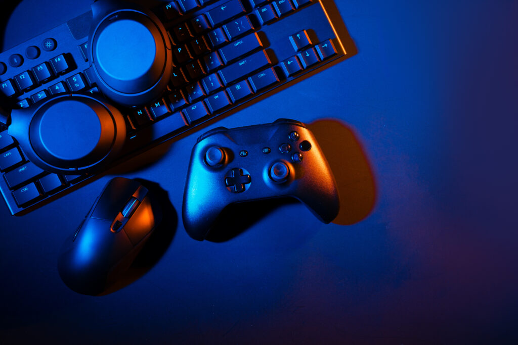 gaming-concept-black-background-with-computer-keyboard-joystick
