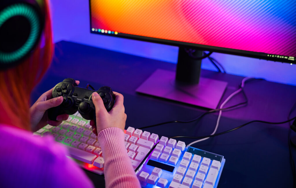 woman-wear-gaming-headphones-playing-live-stream-esports-games-console-home